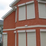 Rolling storm shutters from John's Shutter and Repair deploy in minutes, proctect your home or commercial property from hurricane force winds and secure your property from breakins while you are gone. Call John's Shutter and Repair for a free no-obligatin quote, 409-039-5135.